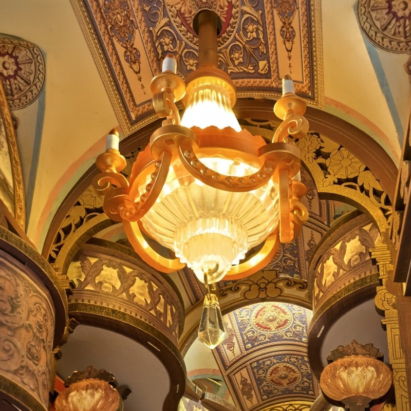 A chandelier with a teardrop pendant