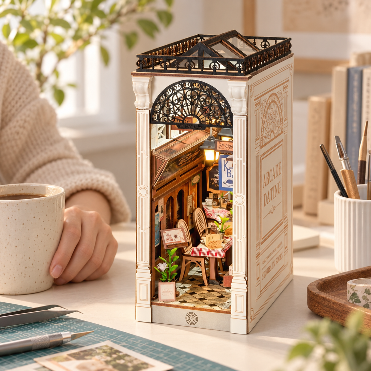 Arcade Dating miniature kit on a home craft table