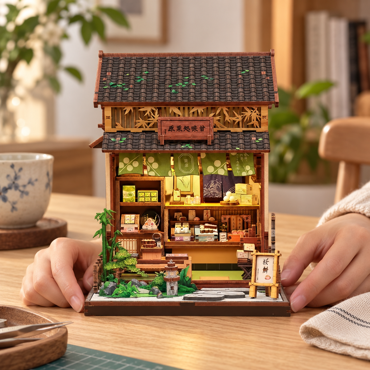 Kurihara Sweet Shop miniature kit on a home craft table