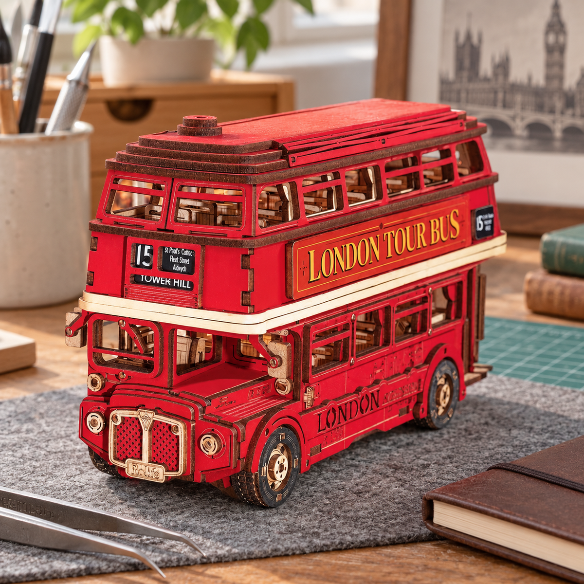 London Tour Bus miniature kit on a home craft table