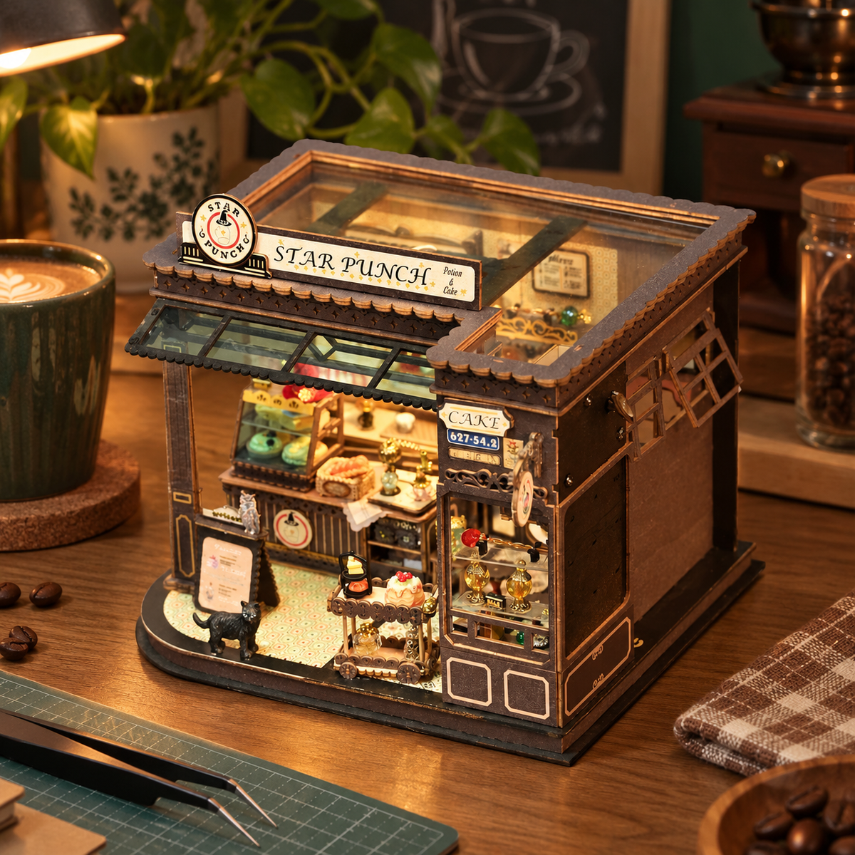 Magic Coffee Cottage miniature kit on a home craft table