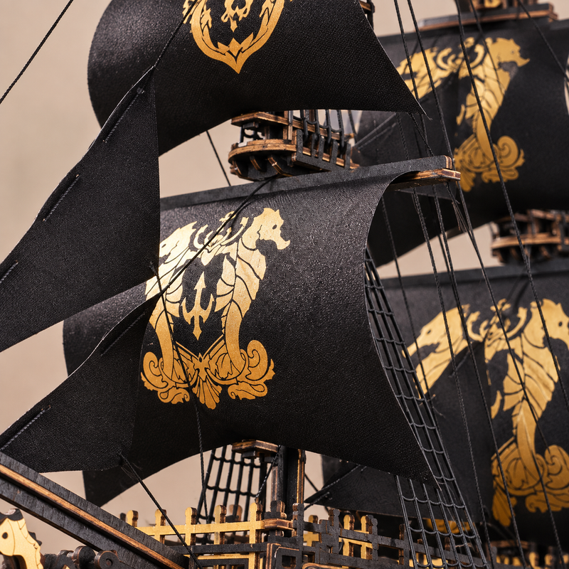 Seahorse emblems on black sails