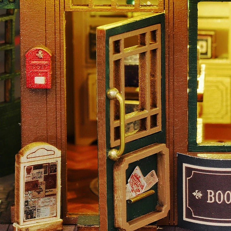 A tiny red mailbox beside the post-office door.