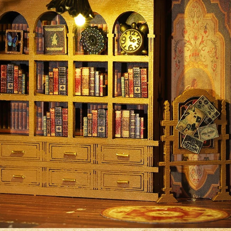 Rows of books beneath a warm reading light.
